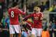 LEIGH, ENGLAND - FEBRUARY 11: Devonte Redmond and Joe Riley of Manchester United U21 celebrate the 1-0 victory after the Barclays Under-21 Premier League Division One match between Manchester United U21 and Manchester City U21 at Leigh Sports Village Stadium on February 11, 2016 in Leigh, England. (Photo by Matthew Ashton - AMA / via Getty Images)