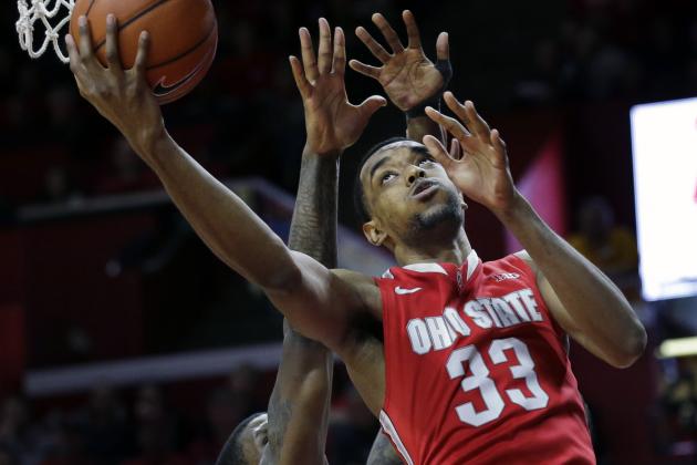 Ohio State forward  Keita Bates-Diop, right, shoots a basket past Rutgers forward Greg Lewis during the second half of an NCAA college basketball game Saturday, Feb. 13, 2016, in Piscataway, N.J. Ohio State won 79-69. (AP Photo/Mel Evans)