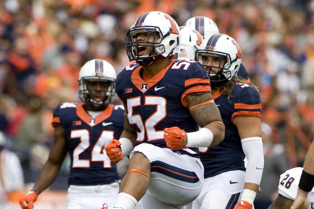 Sep 12, 2015; Champaign, IL, USA; Illinois Fighting Illini linebacker T.J. Neal (52) celebrates a sack against the Western Illinois Leathernecks at Memorial Stadium. Mandatory Credit: Mike Granse-USA TODAY Sports