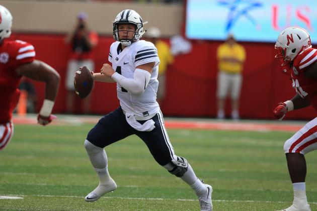 BYU quarterback Taysom Hill (4) runs the ball during the first half of an NCAA college football game against Nebraska in Lincoln, Neb., Saturday, Sept. 5, 2015. (AP Photo/Nati Harnik)