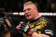 LAS VEGAS, NV - DECEMBER 30: Brock Lesnar announces his retirement in the Octagon after losing to Alistair Overeem during the UFC 141 event at the MGM Grand Garden Arena on December 30, 2011 in Las Vegas, Nevada. (Photo by Josh Hedges/Zuffa LLC/Zuffa LLC via Getty Images)