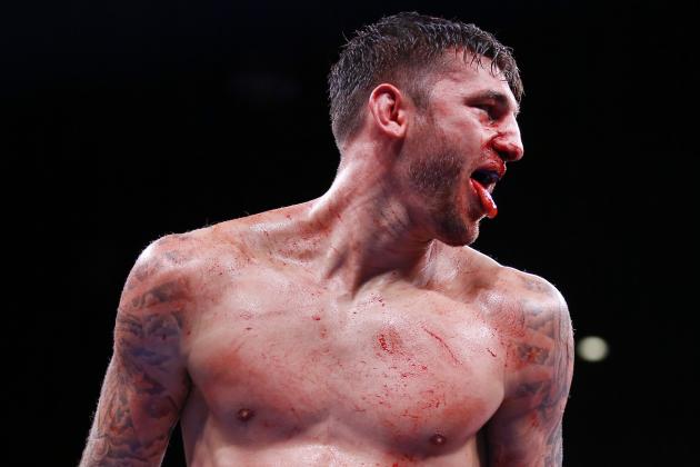 Nathan Cleverly reacts during a light heavyweight boxing bout against Andrzej Fonfara on Friday, Oct. 16, 2015, in Chicago. Fonfara won by unanimous decision. (AP Photo/Kamil Krzaczynski)