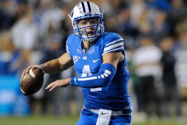 PROVO, UT - OCTOBER 03: Quarterback Taysom Hill #4 of the Brigham Young Cougars runs in early game action during their game against the Utah State Aggies at LaVell Edwards Stadium on October 3, 2014 in Provo, Utah. (Photo by Gene Sweeney Jr/Getty Images )
