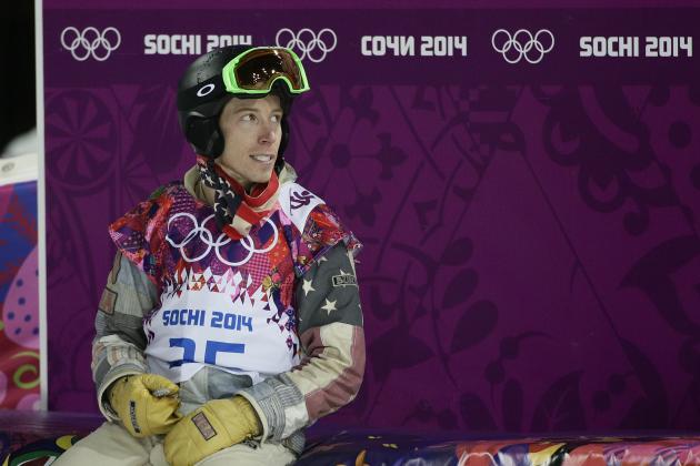 Shaun White, of the United States, looks at the scoreboard after competing in the men's snowboard halfpipe final at the Rosa Khutor Extreme Park, at the 2014 Winter Olympics, Tuesday, Feb. 11, 2014, in Krasnaya Polyana, Russia. White placed fourth. (AP Photo/Jae C. Hong)