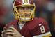 Washington Redskins quarterback Kirk Cousins (8) warms up before an NFL wild card playoff football game against the Green Bay Packers in Landover, Md., Sunday, Jan. 10, 2016. (AP Photo/Nick Wass)