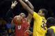 Maryland's Rasheed Sulaimon, left, loses the ball after Minnesota's Ahmad Gilbert Jr. knocked it away during the first half of an NCAA college basketball game Thursday, Feb. 18, 2016, in Minneapolis. (AP Photo/Jim Mone)
