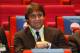 Italy's coach Antonio Conte smiles as he takes his seat for the Euro 2016 soccer championships draw in Paris Saturday, Dec. 12, 2015. (AP Photo/Michel Euler)