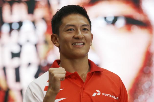 Rio Haryanto, the first Indonesian Formula One driver, poses for photographers during a press conference in Jakarta, Indonesia, Thursday, Feb. 18, 2016. F1 team Manor has appointed Rio Haryanto as one of its race drivers for the coming season. (AP Photo/Achmad Ibrahim)