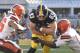 Cleveland Browns inside linebacker Karlos Dansby (56) and free safety K'Waun Williams (36) tackle Pittsburgh Steelers tight end Heath Miller (83) after he made a catch in an NFL football game, Sunday, Nov. 15, 2015, in Pittsburgh. (AP Photo/Don Wright)