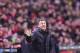 FC Barcelona's head coach Luis Enrique, gives instructions during their Spanish La Liga soccer match between Sporting de Gijon and FC Barcelona, at El Molinon stadium, in Gijon, northern Spain, Wednesday, Feb.17, 2016. (AP Photo/Alvaro Barrientos)