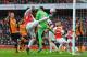 Arsenal's English defender Calum Chambers (C) tries to shoot past Hull City's Swiss goalkeeper Eldin Jakupovic (3R) during the FA cup fifth round football match between Arsenal and Hull City at the Emirates Stadium in London on February 20, 2016. / AFP / GLYN KIRK / RESTRICTED TO EDITORIAL USE. No use with unauthorized audio, video, data, fixture lists, club/league logos or 'live' services. Online in-match use limited to 75 images, no video emulation. No use in betting, games or single club/league/player publications. / (Photo credit should read GLYN KIRK/AFP/Getty Images)