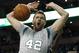 Boston Celtics' David Lee comes down after dunking during the second quarter of an NBA basketball game against the Brooklyn Nets in Boston, Saturday, Jan. 2, 2016. (AP Photo/Michael Dwyer)