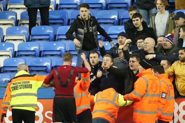 READING, ENGLAND - FEBRUARY 20:  Chris Brunt (2nd L) of West Bromwich Albion reacts after being hit by an object during the Emirates FA Cup fifth round match between Reading and West Bromwich Albion at the Madejski Stadium on February 20, 2016 in Reading, England.  (Photo by Ben Hoskins/Getty Images)