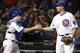 Chicago Cubs relief pitcher Tommy Hunter, right, celebrates with catcher Miguel Montero after the Cubs defeated the Atlanta Braves 7-1 in a baseball game Thursday, Aug. 20, 2015, in Chicago. (AP Photo/Nam Y. Huh)