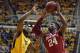 MORGANTOWN, WV - FEBRUARY 20: Buddy Hield #24 of the Oklahoma Sooners and Tarik Phillip #12 of the West Virginia Mountaineers battle for a rebound during the game at the WVU Coliseum on February 20, 2016 in Morgantown, West Virginia. (Photo by Justin K. Aller/Getty Images)