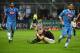Napoli's Gonzalo Higuain (left) and Dries Mertens celebrate after Rodrigo Ely's own goal capped their 4-0 rout at the San Siro.