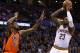 Oklahoma City Thunder forward Kevin Durant (35) defends as Cleveland Cavaliers forward LeBron James (23) shoots during the first quarter of an NBA basketball game in Oklahoma City, Sunday, Feb. 21, 2016. (AP Photo/Alonzo Adams)