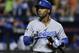 Los Angeles Dodgers shortstop Jimmy Rollins (11) reacts after striking out against the New York Mets during the first inning of baseball's Game 3 of the National League Division Series, Monday, Oct. 12, 2015, in New York. (AP Photo/Julie Jacobson)