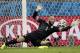 FILE - In this July 1, 2014, file photo, United States' goalkeeper Tim Howard saves a shot by Belgium during a World Cup round of 16 soccer match at the Arena Fonte Nova in Salvador, Brazil. Howard has won the 2014 Player of the Year award on Thursday, Dec. 4, 2014, for his work with the U.S. national team. It is the first time Howard has won the prestigious honor given to a U.S. team member by Futbol de Primera. (AP Photo/Felipe Dana, File)