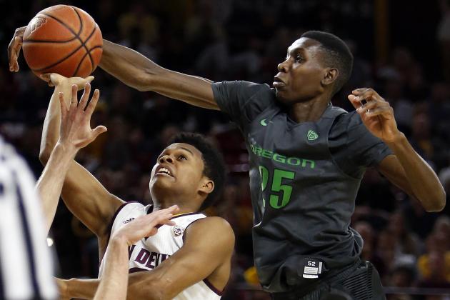 Oregon forward Chris Boucher (25) blocks Arizona State guard Tra Holder shot during the second half of an NCAA college basketball game, Sunday, Jan. 31, 2016, in Tempe, Ariz. Oregon defeated Arizona State 91-74. (AP Photo/Rick Scuteri)