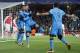 Barcelona players Neymar, left, and Luis Suarez celebrate after Lionel Messi, centre, scored the opening goal during the soccer Champions League round of 16 first leg soccer match between Arsenal and Barcelona at the Emirates stadium in London, Tuesday, Feb. 23, 2016. (AP Photo/Frank Augstein)