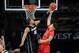 Feb 24, 2016; Boulder, CO, USA; Colorado Buffaloes forward Josh Scott (40) blocks a shot by Arizona Wildcats guard Gabe York (1) in the first half at the Coors Events Center. Mandatory Credit: Ron Chenoy-USA TODAY Sports