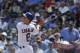 Chicago Cubs' Chris Coghlan hits a single against the Arizona Diamondbacks during the first inning of a baseball game Friday, Sept. 4, 2015, in Chicago. (AP Photo/Nam Y. Huh)