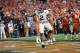Alabama's Derrick Henry (2) celebrates a touchdown run during the second half of the NCAA college football playoff championship game against Clemson, Monday, Jan. 11, 2016, in Glendale, Ariz. (AP Photo/David J. Phillip)