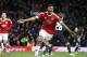 United’s Marcus Rashford celebrates after scoring during the Europa League round of 32 second leg soccer match between Manchester United and FC Midtjylland in Manchester, England, Thursday, Feb. 25, 2016 . (AP Photo/Jon Super)