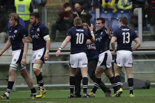 Scotland’s John Hardie, second from right, celebrates after scoring during a Six Nations rugby union international match between Italy and Scotland, in Rome, Saturday, Feb. 27, 2016. (AP Photo/Alessandra Tarantino)