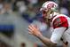 MIAMI, FL - DECEMBER 21: Brandon Doughty #12 of the Western Kentucky Hilltoppers calls a play during the 2015 Miami Beach Bowl against the South Florida Bulls at Marlins Park on December 21, 2015 in Miami, Florida. (Photo by Mike Ehrmann/Getty Images)