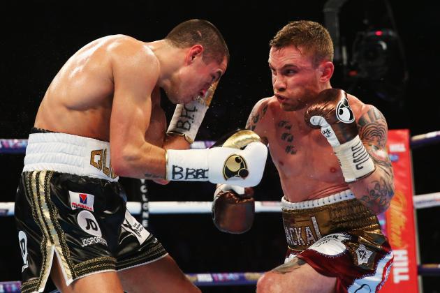 MANCHESTER, ENGLAND - FEBRUARY 27:  Carl Frampton (R) and Scott Quigg in action during their World Super-Bantamweight title contest at Manchester Arena on February 27, 2016 in Manchester, England.  (Photo by Alex Livesey/Getty Images)