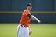 Baltimore Orioles pitcher Chris Tillman follows through on a throw during a spring training baseball workout in Sarasota, Fla., Tuesday, Feb. 23, 2016. (AP Photo/Patrick Semansky)