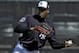 New York Yankees pitcher Aroldis Chapman throws a ball during a spring training baseball workout Friday, Feb. 19, 2016, in Tampa, Fla. (AP Photo/Chris O'Meara)