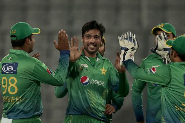 Pakistan’s Mohammad Amir, center, celebrates with his teammates the wicket of United Arab Emirates’ Muhammad Kaleem during their Asia Cup Twenty20 international cricket match in Dhaka, Bangladesh, Monday, Feb. 29, 2016. (AP Photo/A.M. Ahad)