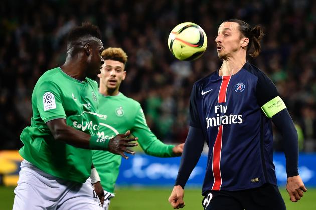 Saint-Etienne's Senegalese defender Moustapha Bayal Sall (L) vies with Paris Saint-Germain's Swedish forward Zlatan Ibrahimovic (R) during the Ligue1 football match between AS Saint-Etienne and Paris Saint-Germain, on January 31, 2016 at the Geoffroy Guichard stadium in Saint-Etienne, central France.  AFP PHOTO / JEFF PACHOUD / AFP / JEFF PACHOUD        (Photo credit should read JEFF PACHOUD/AFP/Getty Images)