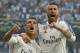 Real Madrid's Sergio Ramos, right, celebrates with Real Madrid's Cristiano Ronaldo who scored 1-0 during the Champions League second leg semifinal soccer match between Real Madrid and Juventus, at the Santiago Bernabeu stadium in Madrid, Wednesday, May 13, 2015. (AP Photo/Daniel Ochoa de Olza)