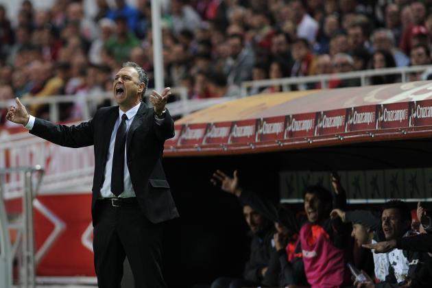 Granada's coach Joaquin Caparros (L) reacts during the Spanish league football match Sevilla FC vs Granada FC at the Ramon Sanchez Pizjuan stadium in Sevilla on November 30, 2014. Sevilla won the match 5-1. AFP PHOTO/ CRISTINA QUICLER (Photo credit should read CRISTINA QUICLER/AFP/Getty Images)