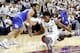 Texas A&M's Tavario Miller (42) looses his balance while going after a loos ball against Kentucky's Isaiah Briscoe (13) during the first half of an NCAA college basketball game, Saturday, Feb. 20, 2016, in College Station, Texas. (AP Photo/Sam Craft)