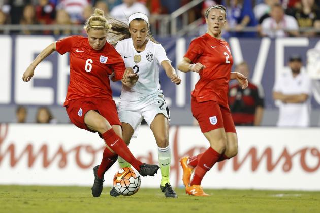 United States' Mallory Pugh, center, is sandwiched between the defense of England's Gilly Rafferty (6) and Lucy Bronze during the first half of a SheBelieves Cup women's soccer match Thursday, March 3, 2016, in Tampa, Fla. (AP Photo/Mike Carlson)