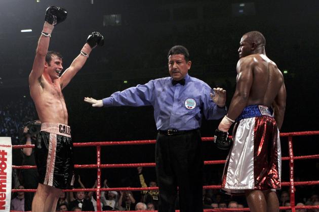 MANCHESTER, ENGLAND - MARCH 5:  Joe Calzaghe (L) celebrates his win against Jeff Lacy during the WBO and IBF super middleweight unification title fight at the MEN Arena on March 5, 2006 in Manchester, England. Calzaghe won the fight by unanimous decision to take the IBF super-middleweight title from Lacy and retain his WBO title.  (Photo by John Gichigi/Getty images)