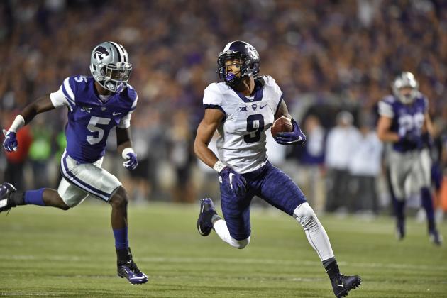 MANHATTAN, KS - OCTOBER 10:  Wide receiver Josh Doctson #9 of the TCU Horned Frogs runs past defensive back Jesse Mack #5 of the Kansas State Wildcats to score the game winning touchdown during the second half on October 10, 2015 at Bill Snyder Family Stadium in Manhattan, Kansas.  TCU won 52-45.(Photo by Peter G. Aiken/Getty Images)
