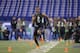 Ohio State defensive back Eli Apple runs a drill at the NFL football scouting combine on Tuesday, March 1, 2016, in Indianapolis. (AP Photo/Darron Cummings)