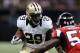 NEW ORLEANS, LA - OCTOBER 15: Khiry Robinson #29 of the New Orleans Saints is pursued by Joplo Bartu #59 of the Atlanta Falcons during the fourth quarter of a game at the Mercedes-Benz Superdome on October 15, 2015 in New Orleans, Louisiana. (Photo by Chris Graythen/Getty Images)