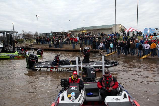A large crowd anticipates the start of the 2012 Bassmaster Classic at the Red River South Marina and Resort in Bossier City, La. on Friday, Feb. 24, 2012. The country's best anglers are competing for a $1.2 million purse. (AP Photo/Mike Silva)