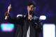 Canadian singer Justin Bieber reacts after receiving the International Male Solo Artist award during the BRIT Awards 2016 in London on February 24, 2016. / AFP / JUSTIN TALLIS / RESTRICTED TO EDITORIAL USE, TO ILLUSTRATE THE EVENT AS SPECIFIED IN THE CAPTION NO POSTERS NO USE IN MONOGRAPHS (Photo credit should read JUSTIN TALLIS/AFP/Getty Images)