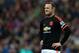 Manchester United's captain Wayne Rooney stands dejected as Sunderland's Wahbi Khazri celebrates his goal during the English Premier League soccer match between Sunderland and Manchester United at the Stadium of Light, Sunderland, England, Saturday, Feb. 13, 2016. (AP Photo/Scott Heppell)