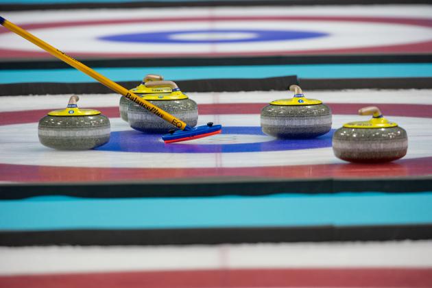 Feb 20, 2014; Sochi, RUSSIA; Detail of the stones on the ice in the women's gold medal curling match between Sweden and Canada during the Sochi 2014 Olympic Winter Games against Sweden at Ice Cube Curling Center. Mandatory Credit: Kevin Liles-USA TODAY Sports