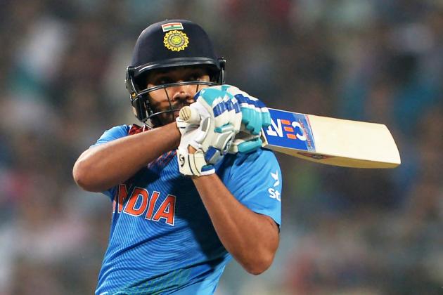 India's Rohit Sharma plays a shot during a warm-up match between India and West Indies for the World T20 cricket tournament at The Eden Gardens Cricket Stadium in Kolkata on March 10, 2016.  / AFP / Dibyangshu SARKAR        (Photo credit should read DIBYANGSHU SARKAR/AFP/Getty Images)