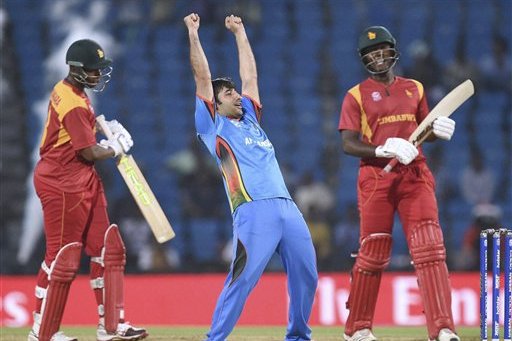 Afghanistan captain Asghar Stanikzai celebrates their victory against Zimbabwe  in the ICC World Twenty20 2016 cricket tournament  in Nagpur, India, Saturday, March 12, 2016. (Shashank Parade/Press Trust of India via AP)